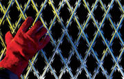 Welded razor wire mesh giveWelded ras a high-security protective fence